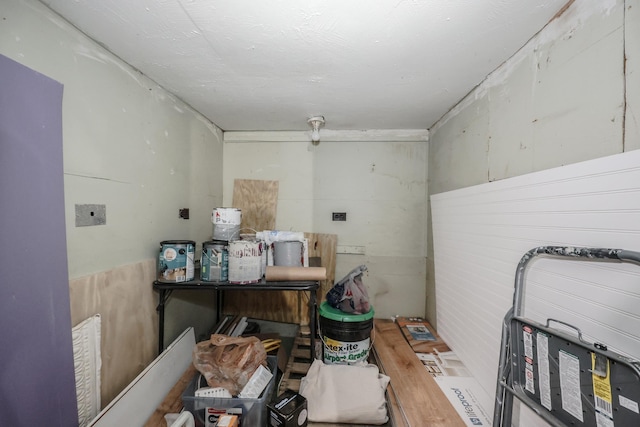 laundry room with a garage