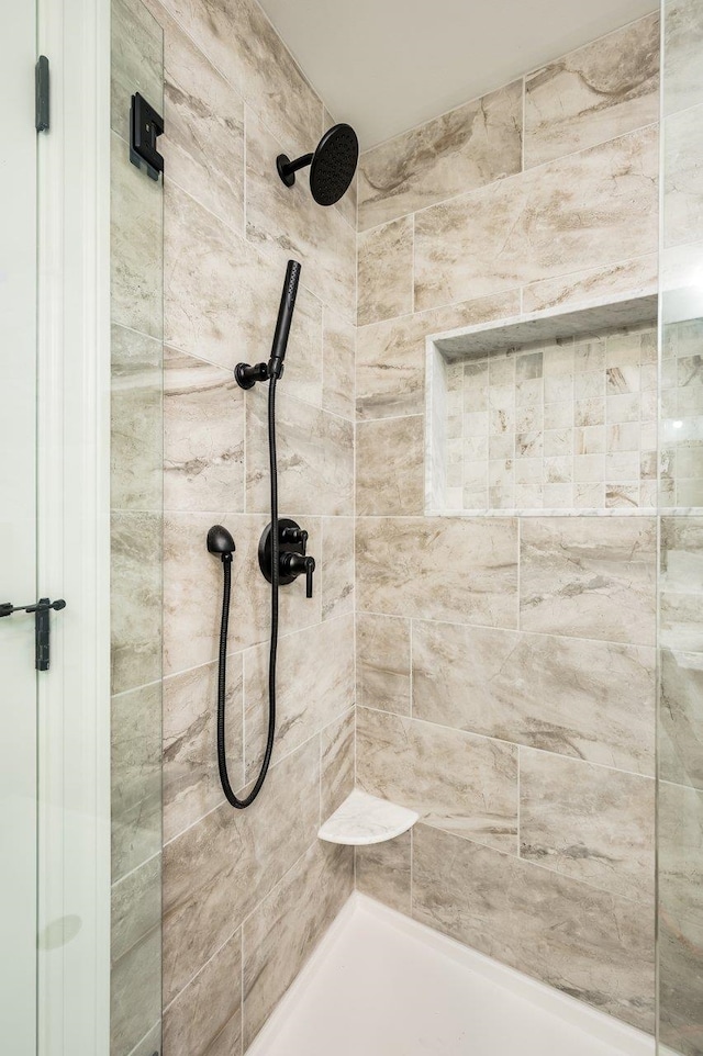 bathroom featuring a stall shower