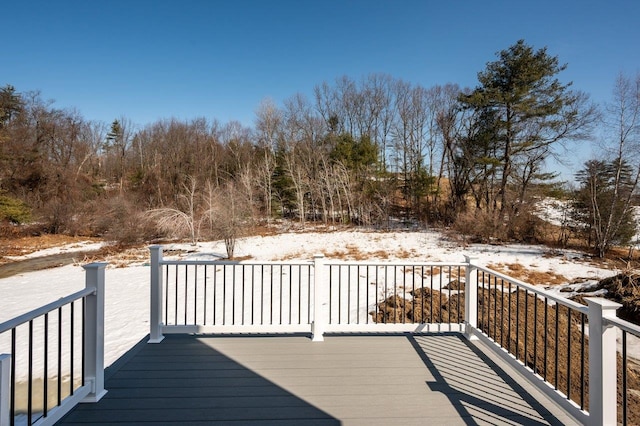 view of snow covered deck