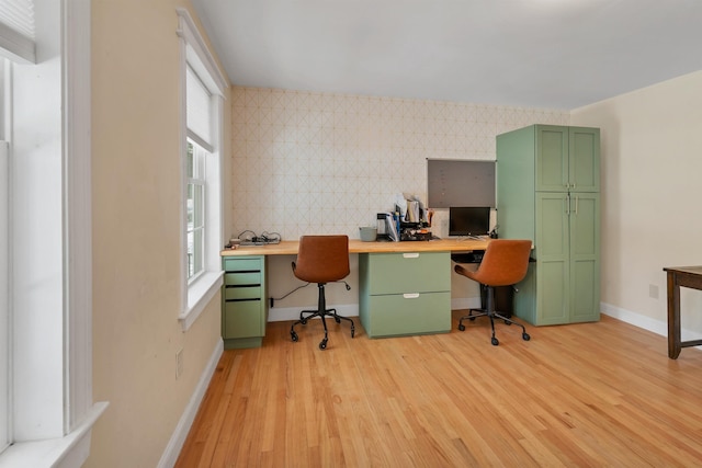 home office featuring baseboards and light wood-style floors