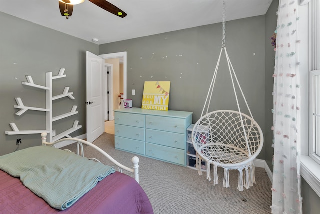 bedroom featuring ceiling fan and carpet floors