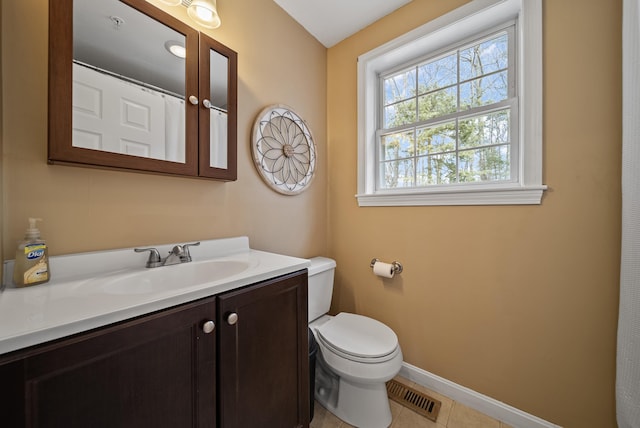 full bath featuring tile patterned floors, visible vents, toilet, baseboards, and vanity