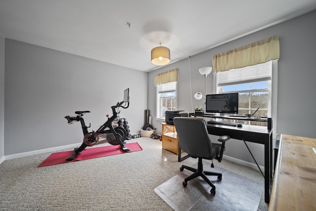 home office featuring baseboards and carpet flooring