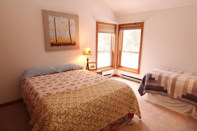 bedroom featuring a baseboard heating unit, lofted ceiling, carpet, and baseboard heating