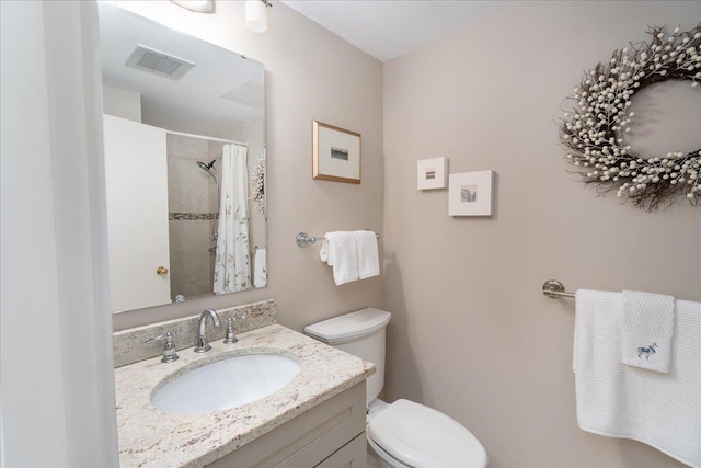 full bath featuring visible vents, toilet, vanity, and a shower with curtain