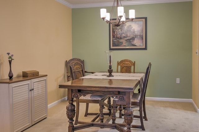 dining room featuring light carpet, baseboards, an inviting chandelier, and ornamental molding