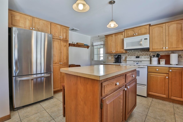 kitchen featuring visible vents, tasteful backsplash, white appliances, light tile patterned flooring, and light countertops