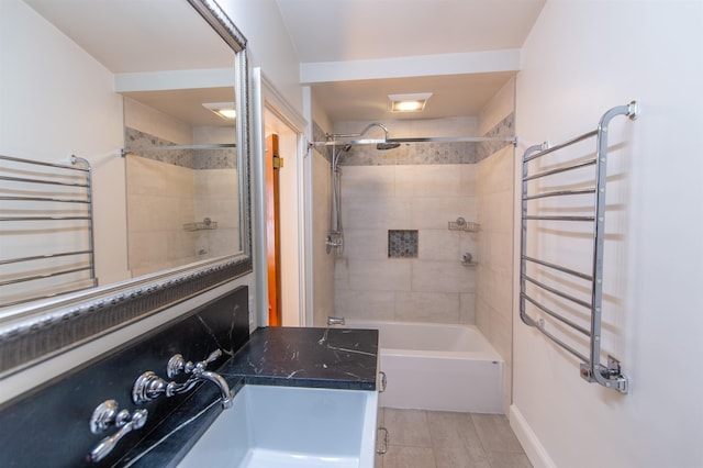 bathroom featuring radiator, shower / bathtub combination, and tile patterned flooring