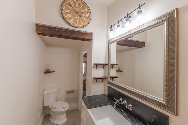 bathroom with tile patterned floors, toilet, and vanity