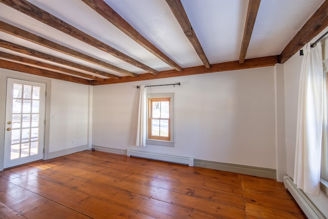 spare room with light wood-type flooring, beamed ceiling, a baseboard radiator, baseboards, and baseboard heating