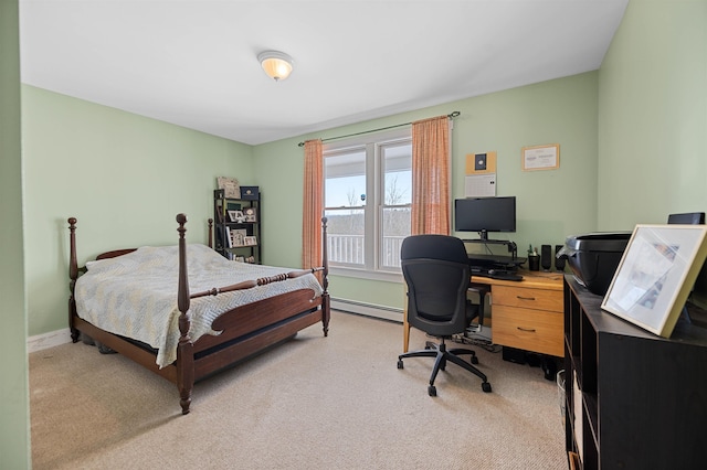 bedroom featuring a baseboard radiator, baseboards, and light carpet