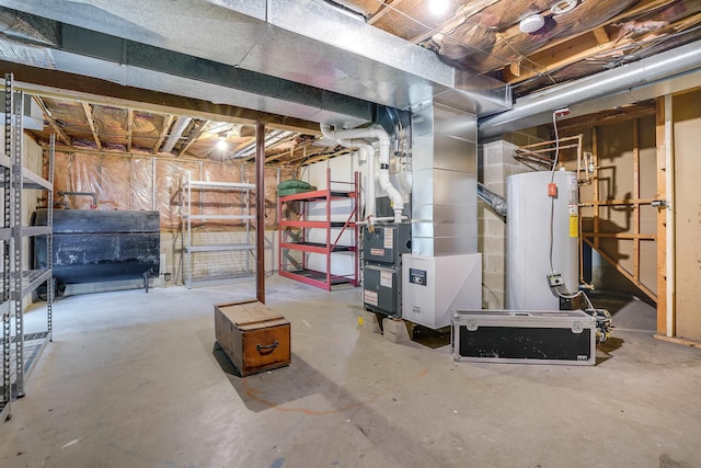 unfinished basement with gas water heater, heating unit, and heating fuel