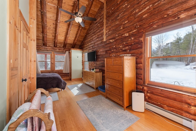 bedroom with wood finished floors, log walls, beam ceiling, wood ceiling, and baseboard heating