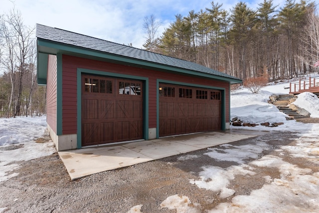 view of snow covered garage