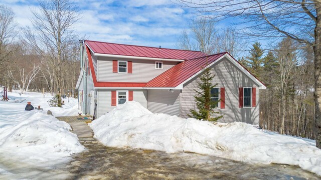 60 Robbins Rd, Dover, VT 05341 - view of front of house with metal roof