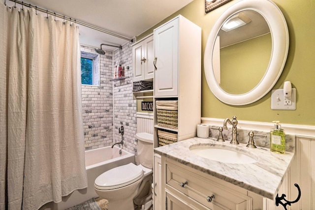 bathroom featuring toilet, vanity, and shower / bathtub combination with curtain