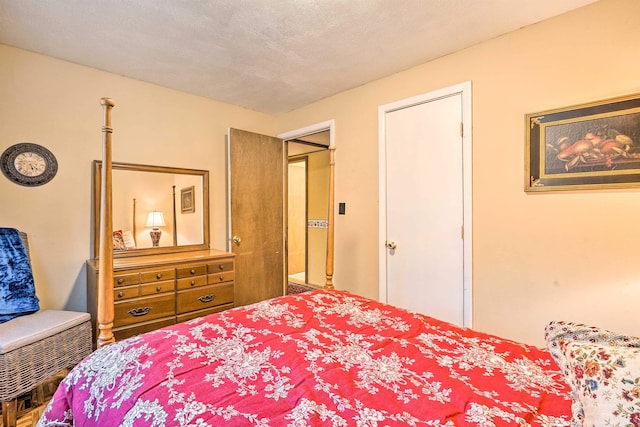 bedroom featuring a textured ceiling