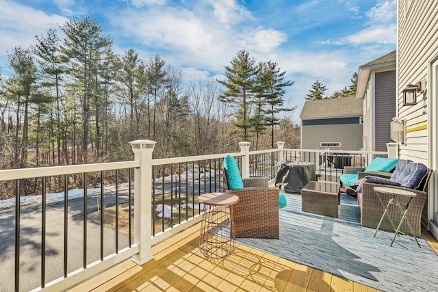 deck with an outdoor hangout area