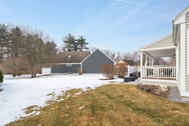 view of yard layered in snow