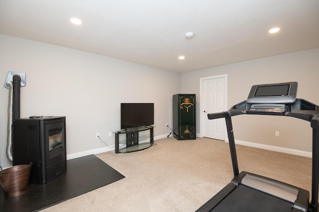 workout area featuring recessed lighting, baseboards, and carpet flooring