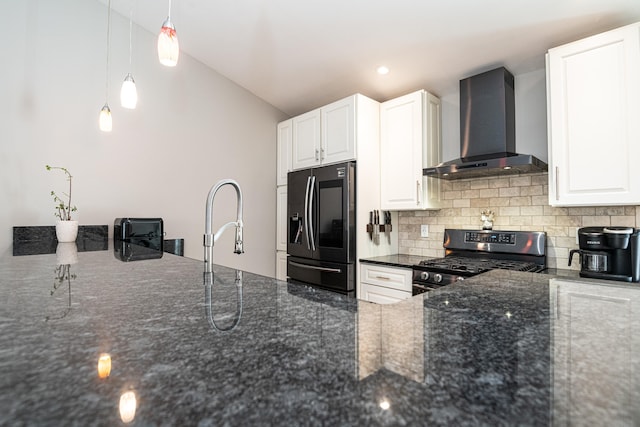 kitchen featuring dark stone counters, black fridge with ice dispenser, gas range, wall chimney exhaust hood, and tasteful backsplash