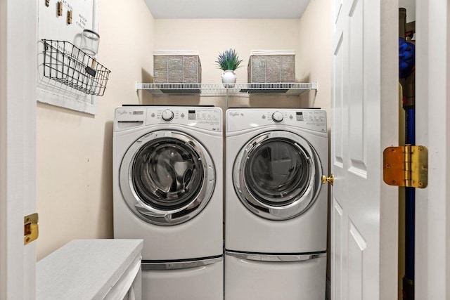 laundry area featuring washer and dryer and laundry area