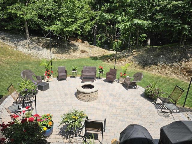 view of patio featuring an outdoor fire pit