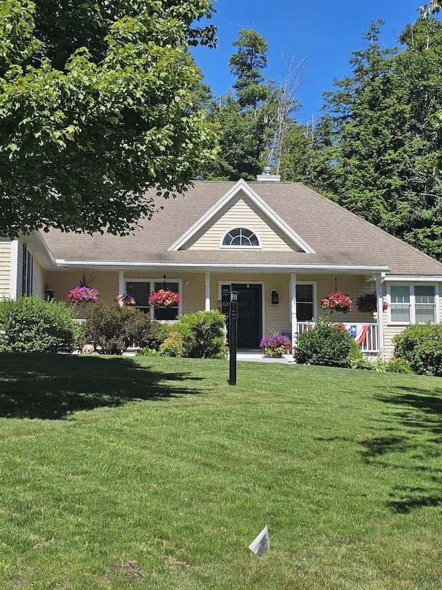 view of front of home with a front lawn