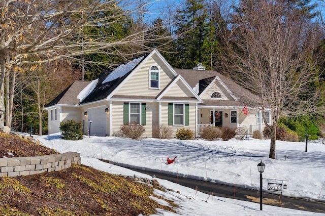 view of front of house featuring an attached garage and driveway