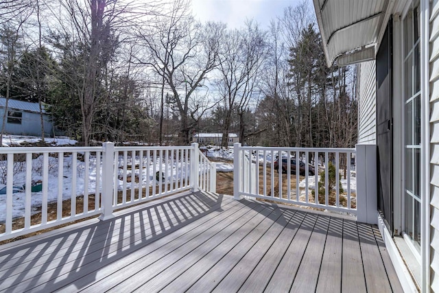 view of snow covered deck