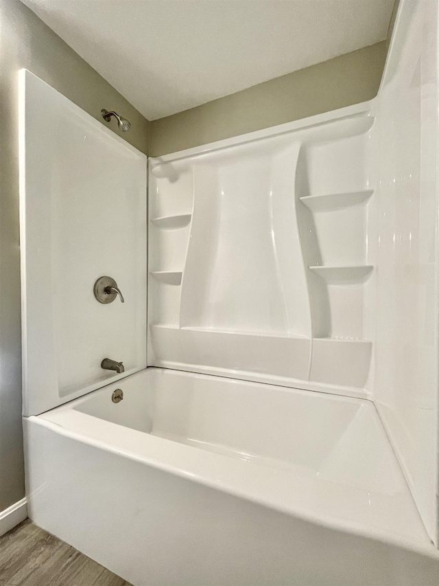 full bathroom featuring wood finished floors