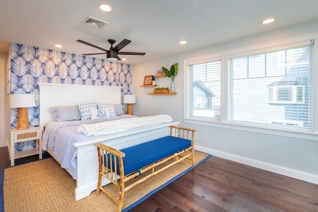 bedroom featuring wood finished floors, baseboards, visible vents, recessed lighting, and ceiling fan