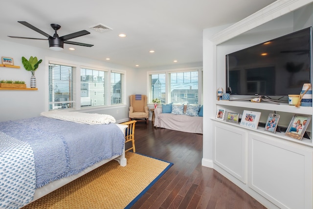 bedroom with visible vents, recessed lighting, and dark wood-style flooring