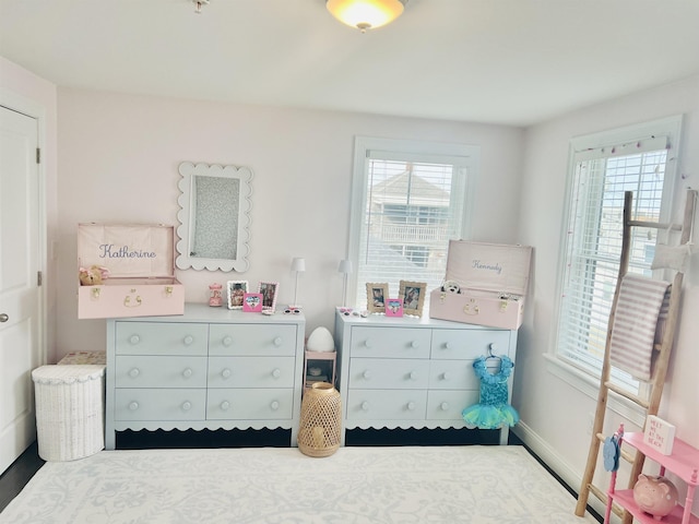 bedroom featuring multiple windows