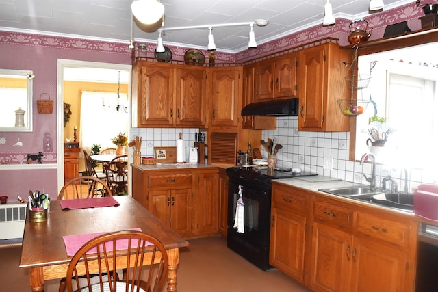 kitchen with wallpapered walls, black range with electric cooktop, under cabinet range hood, and a sink