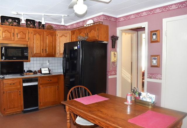 kitchen featuring tile countertops, wallpapered walls, black appliances, and brown cabinets