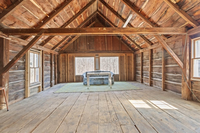 unfinished attic featuring plenty of natural light