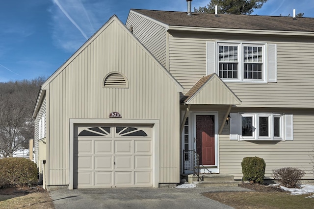 view of front of property featuring a garage