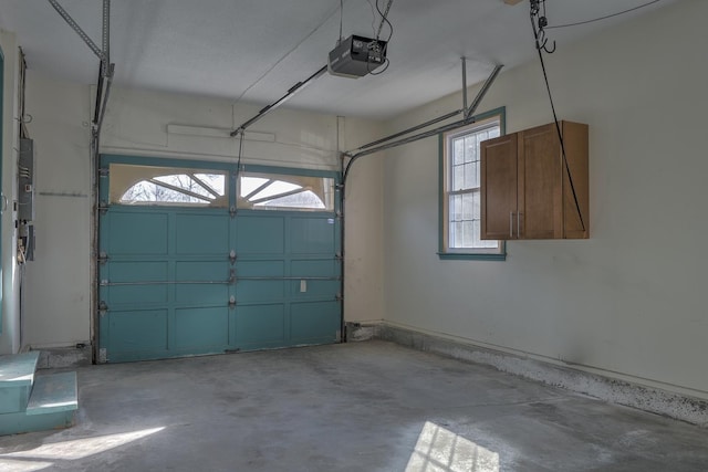 garage featuring a garage door opener