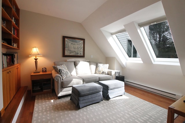 living room with vaulted ceiling with skylight, wood finished floors, and baseboard heating