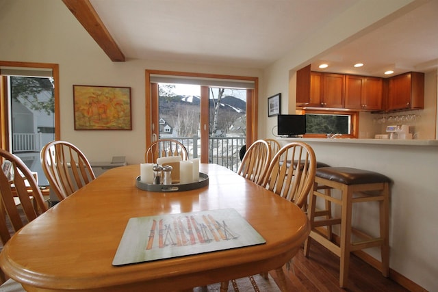 dining area featuring beamed ceiling, recessed lighting, and wood finished floors