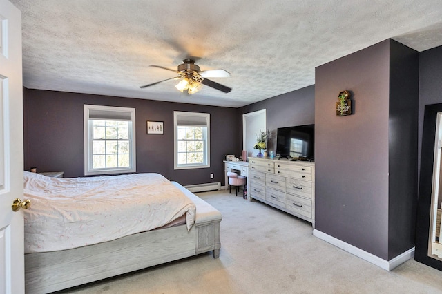 bedroom featuring light carpet, a textured ceiling, a baseboard radiator, baseboards, and ceiling fan