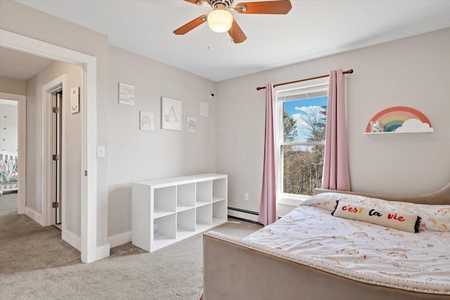 bedroom with carpet flooring, a ceiling fan, baseboards, and a baseboard radiator