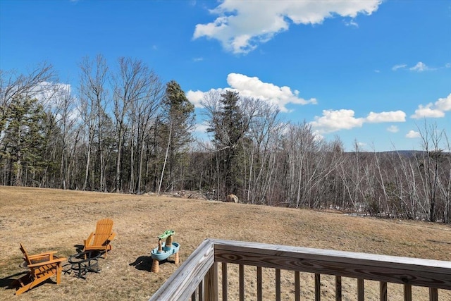 view of yard with a forest view