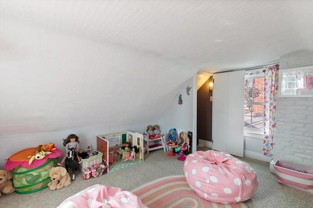 rec room with lofted ceiling and carpet floors