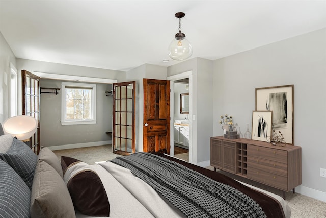 bedroom featuring carpet flooring and baseboards