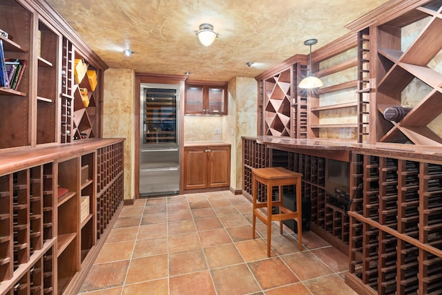 wine room with light tile patterned floors