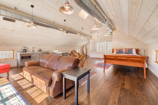 living room featuring hardwood / wood-style floors, wooden ceiling, wood walls, and vaulted ceiling