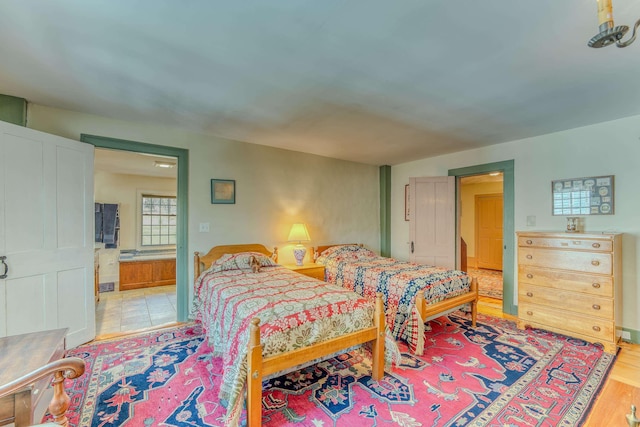 bedroom with light wood-style floors