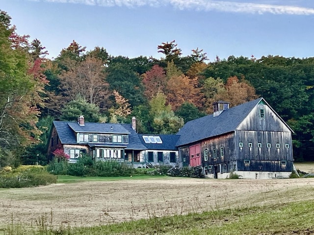 view of front of house with a chimney